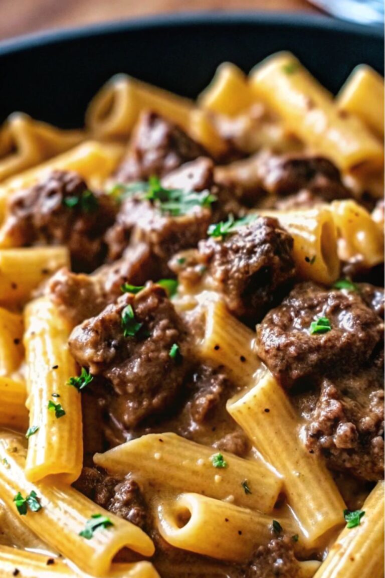 Beef and pasta in a pasta sauce.